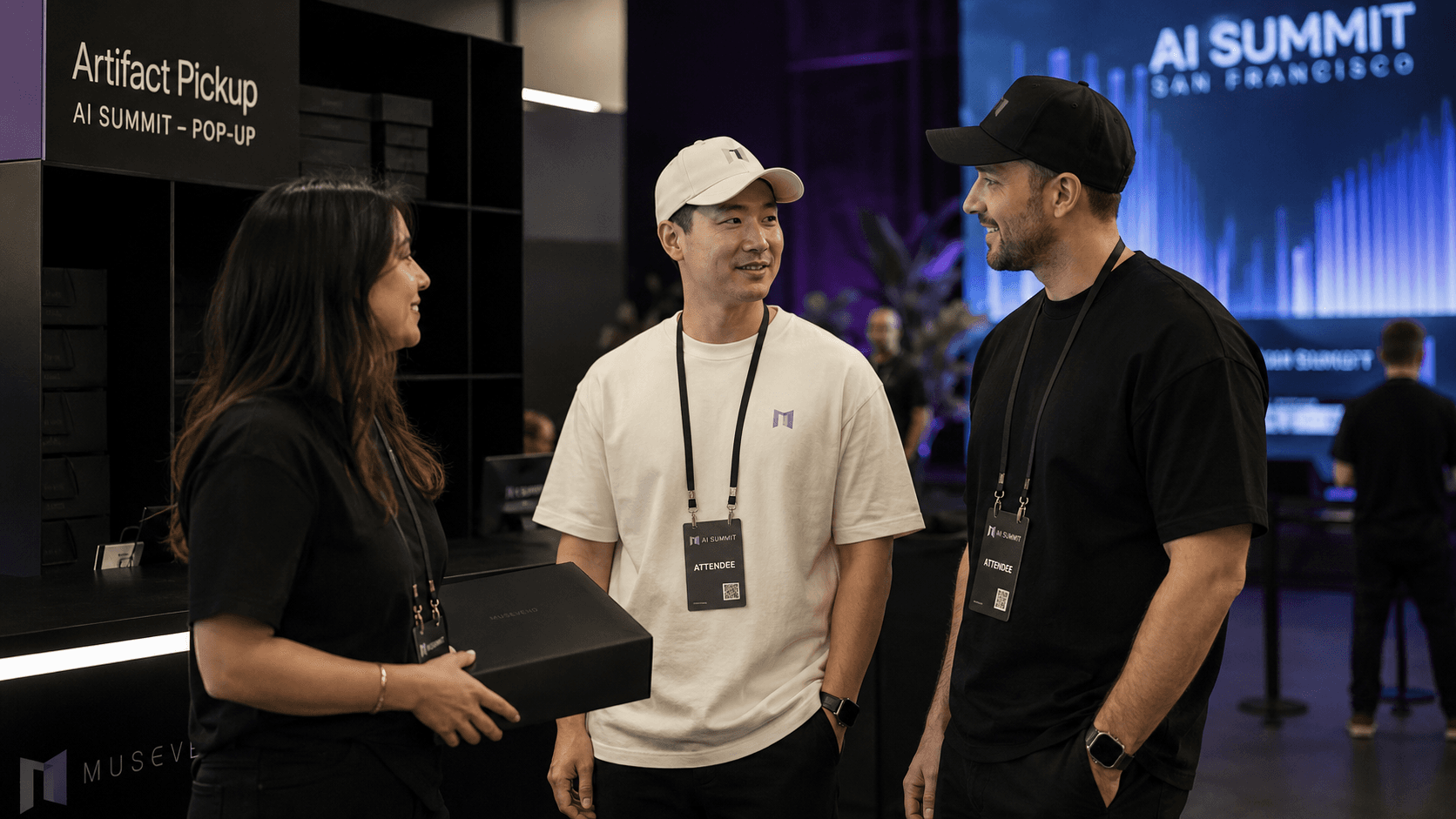 Event attendees wearing the AI company pop-up apparel drop of tees and caps